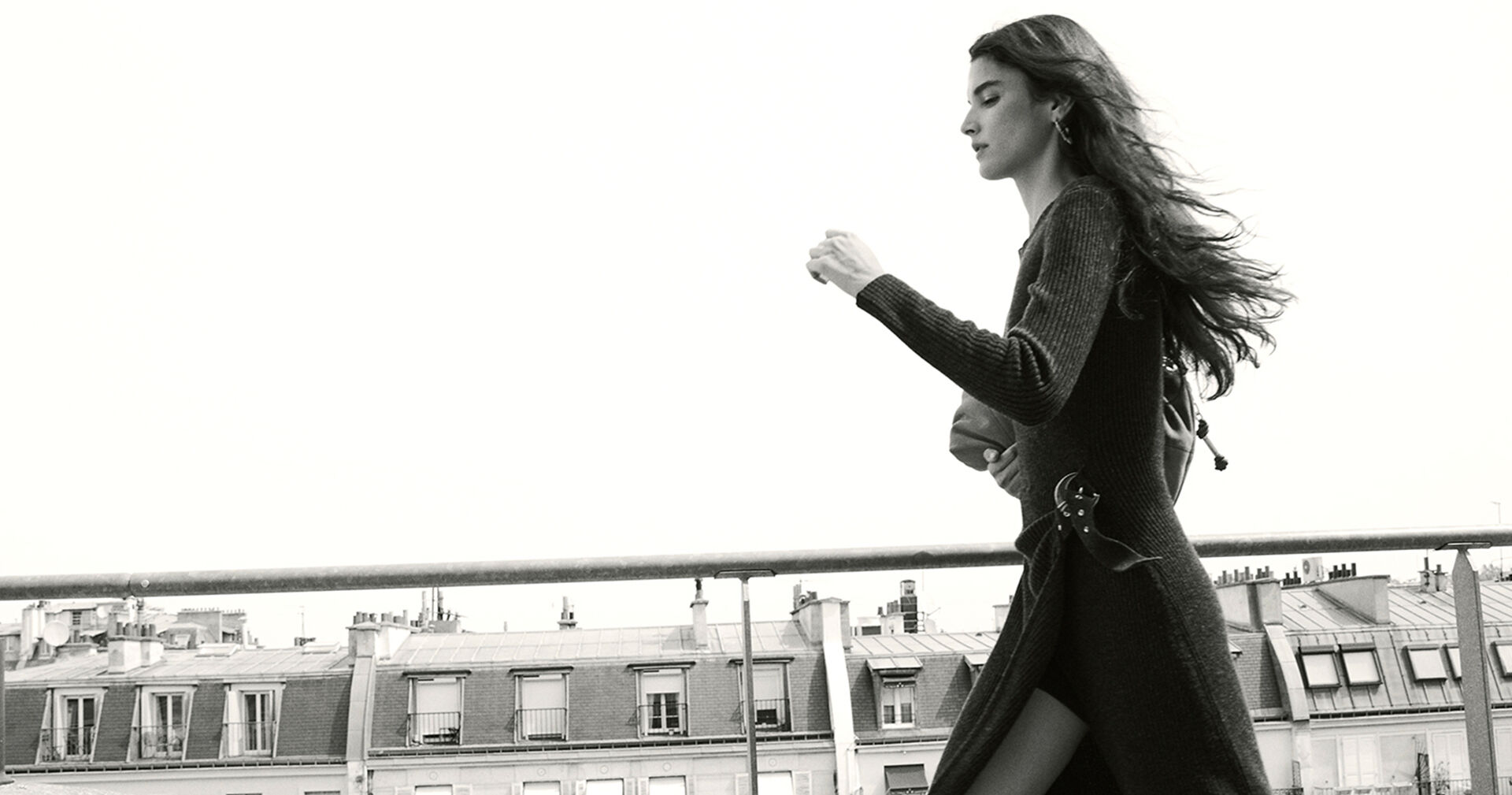 The model is wearing a knit dress 
