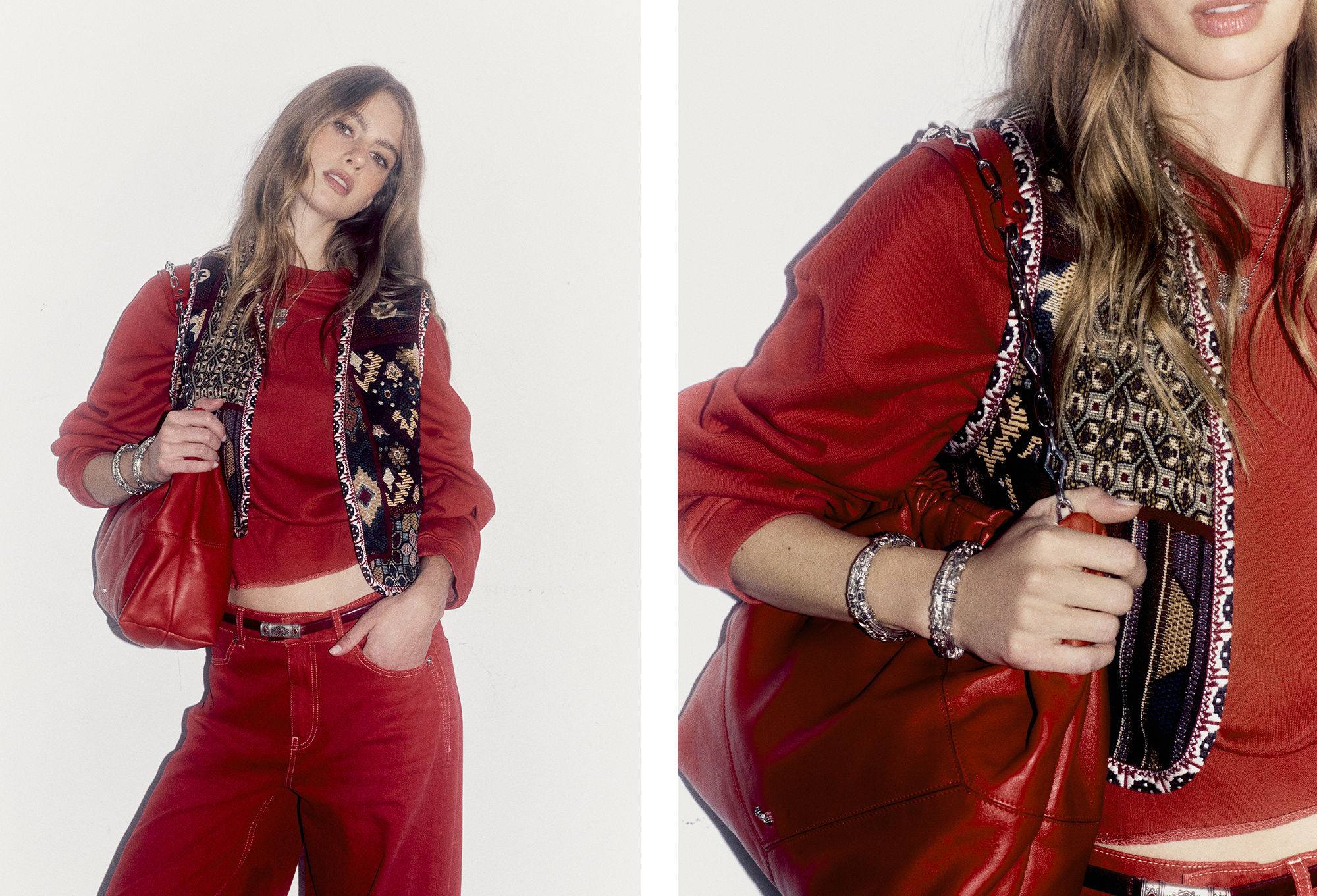Model wearing a full red look with a black bag and a burgundy vest