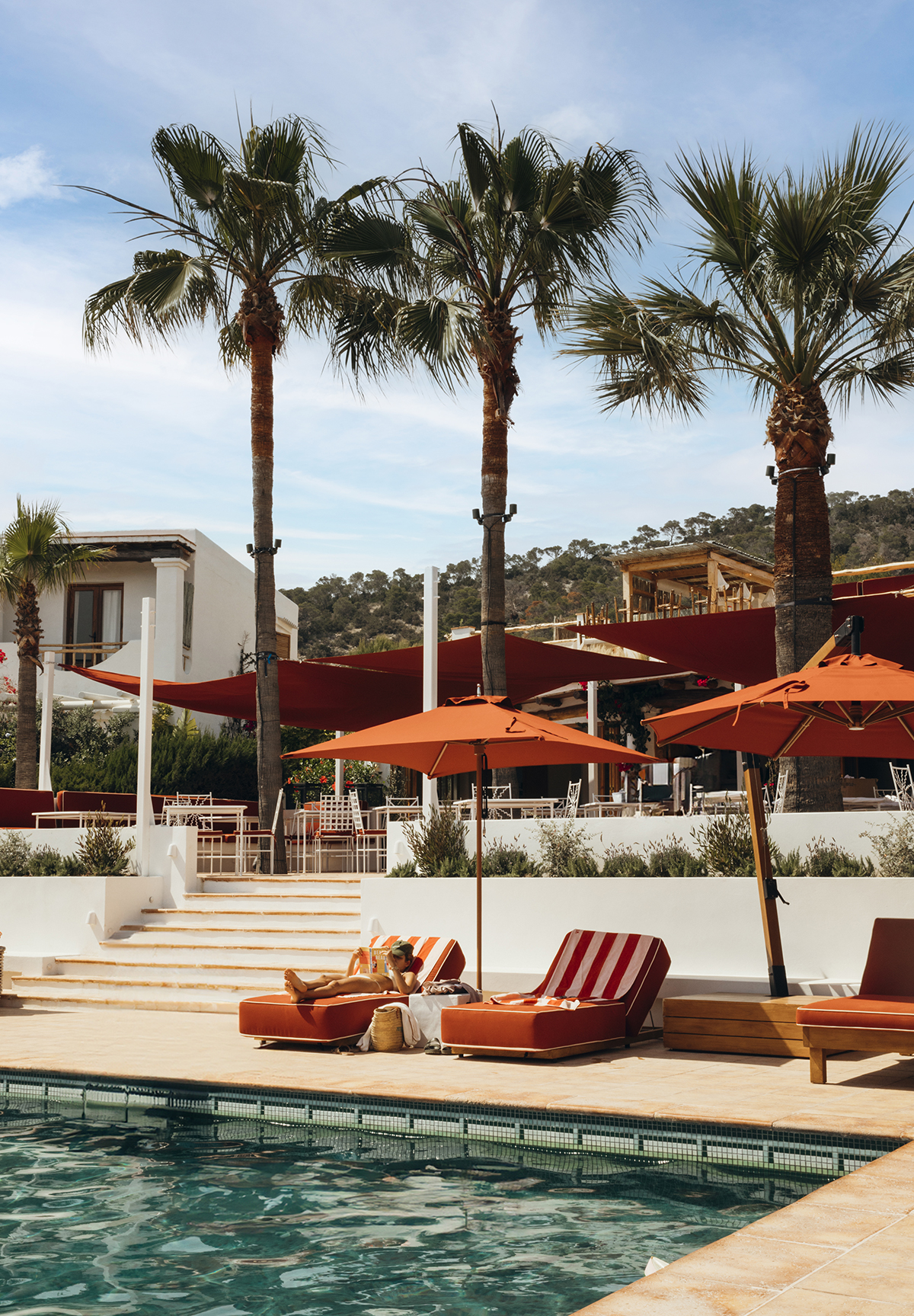 Hotel terrace, umbrellas, swimming pool