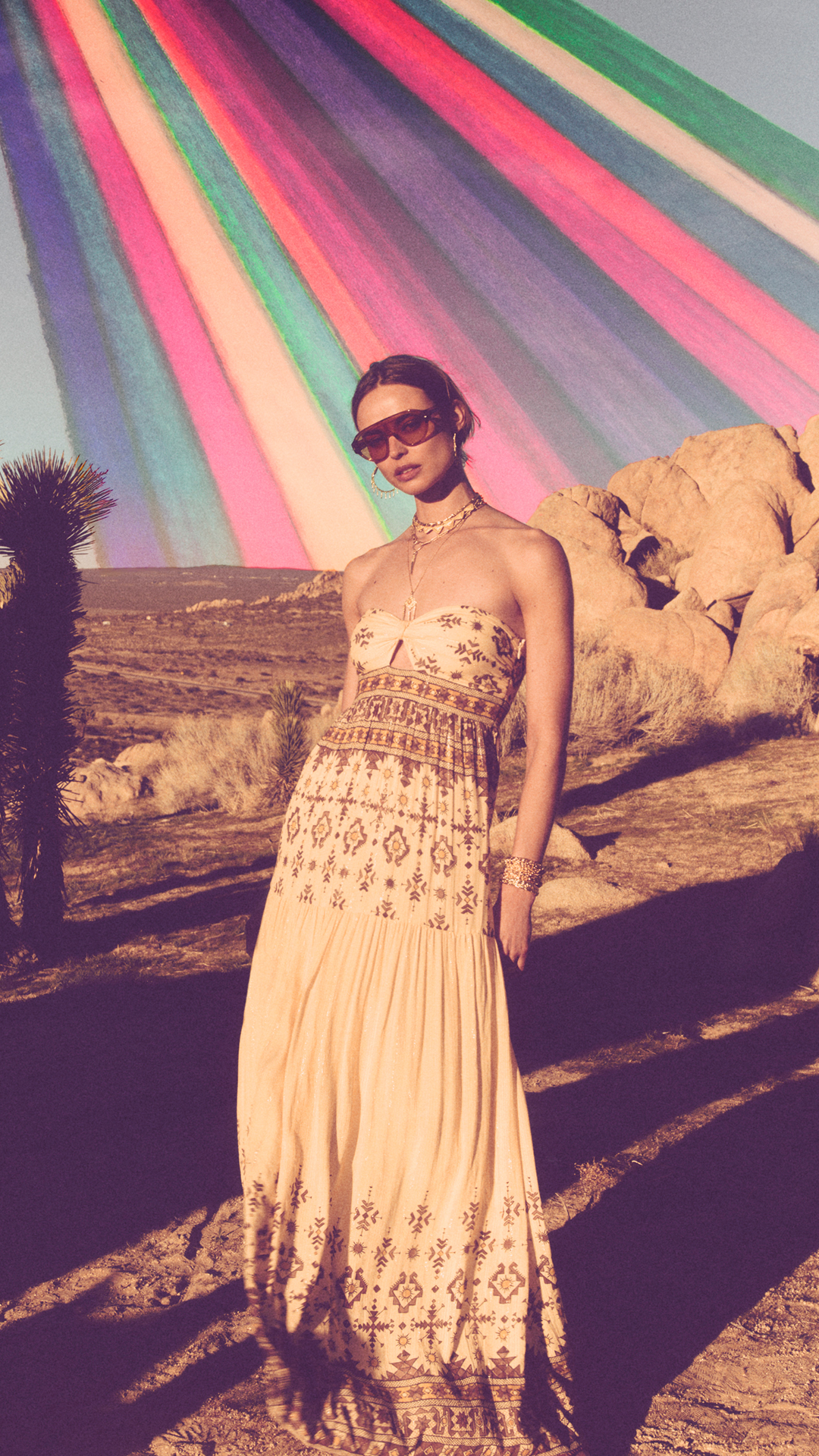 A model wearing a beige knit dress