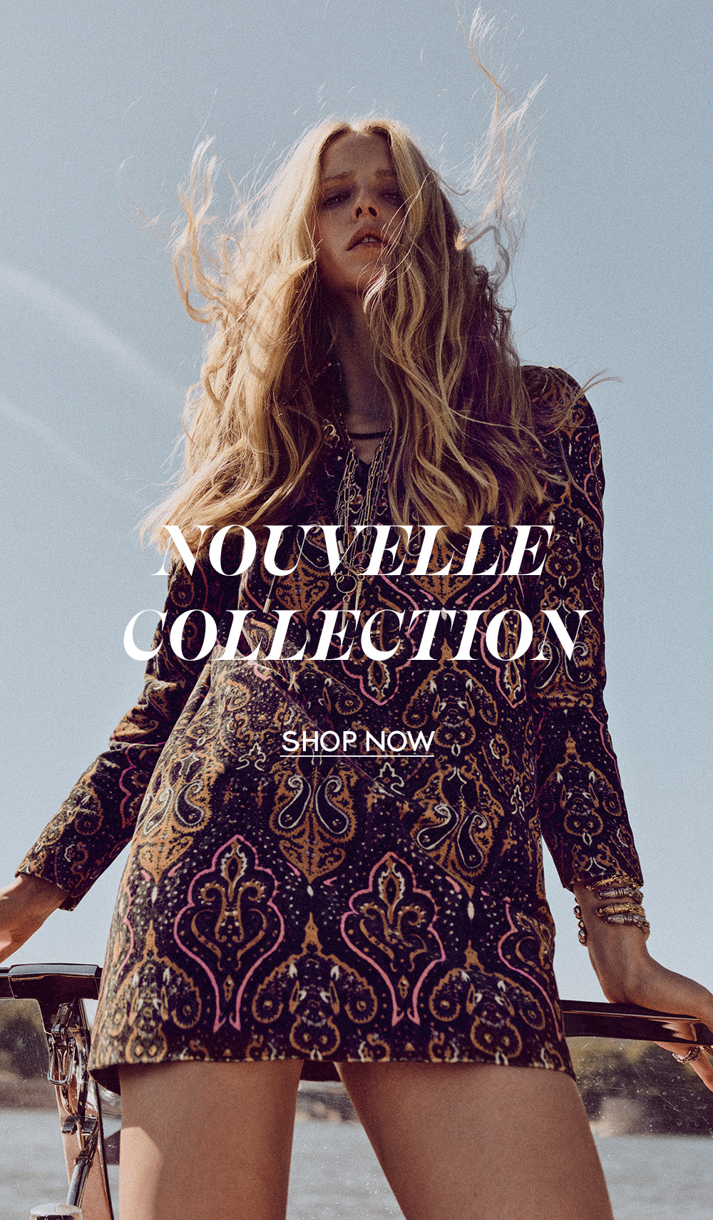 Abby CHampion wearing a ba&sh printed 70s dress