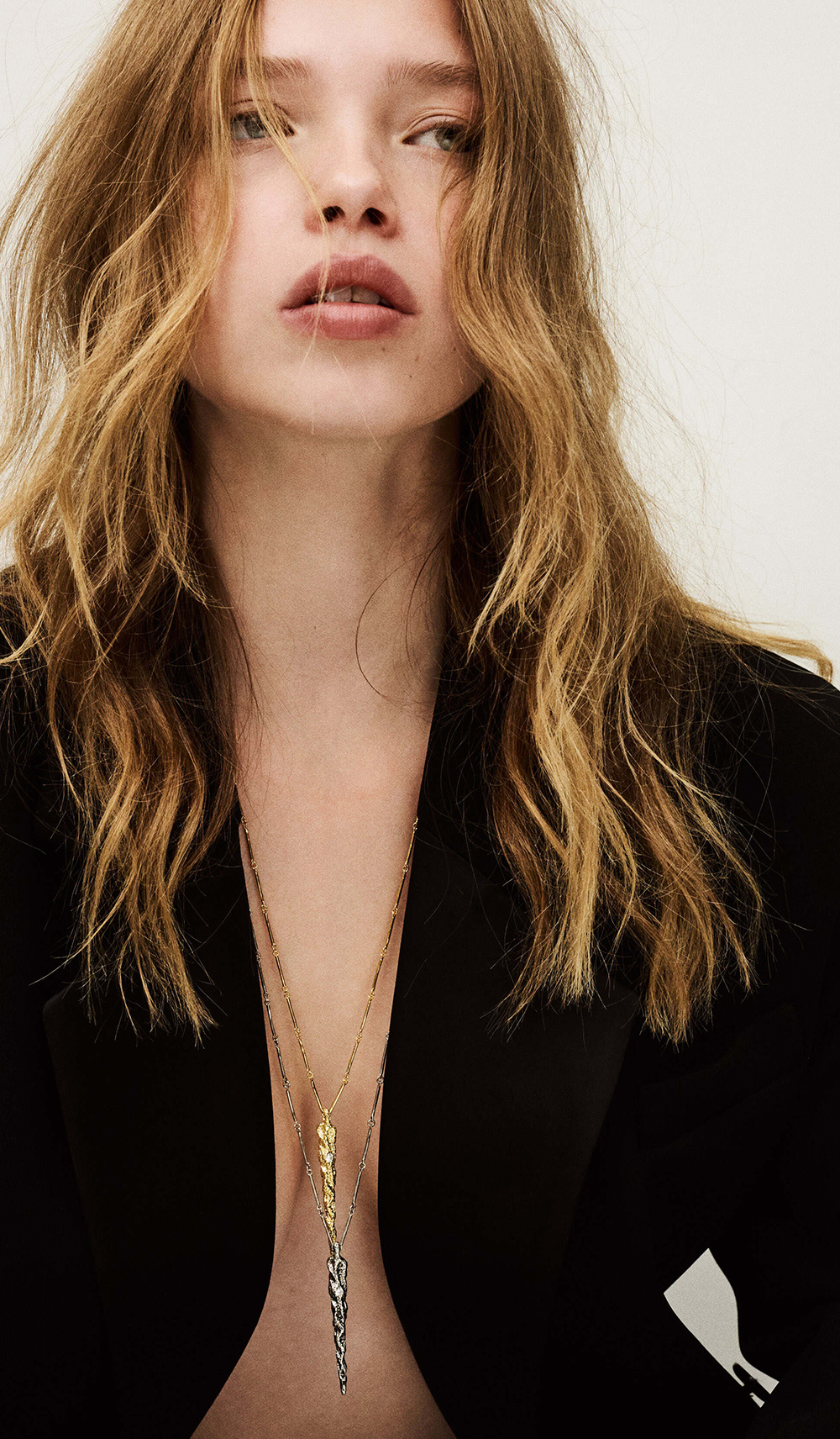Model wearing a beaded jacket 