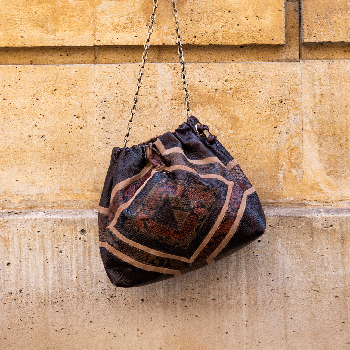 a brownish June patchwork bag