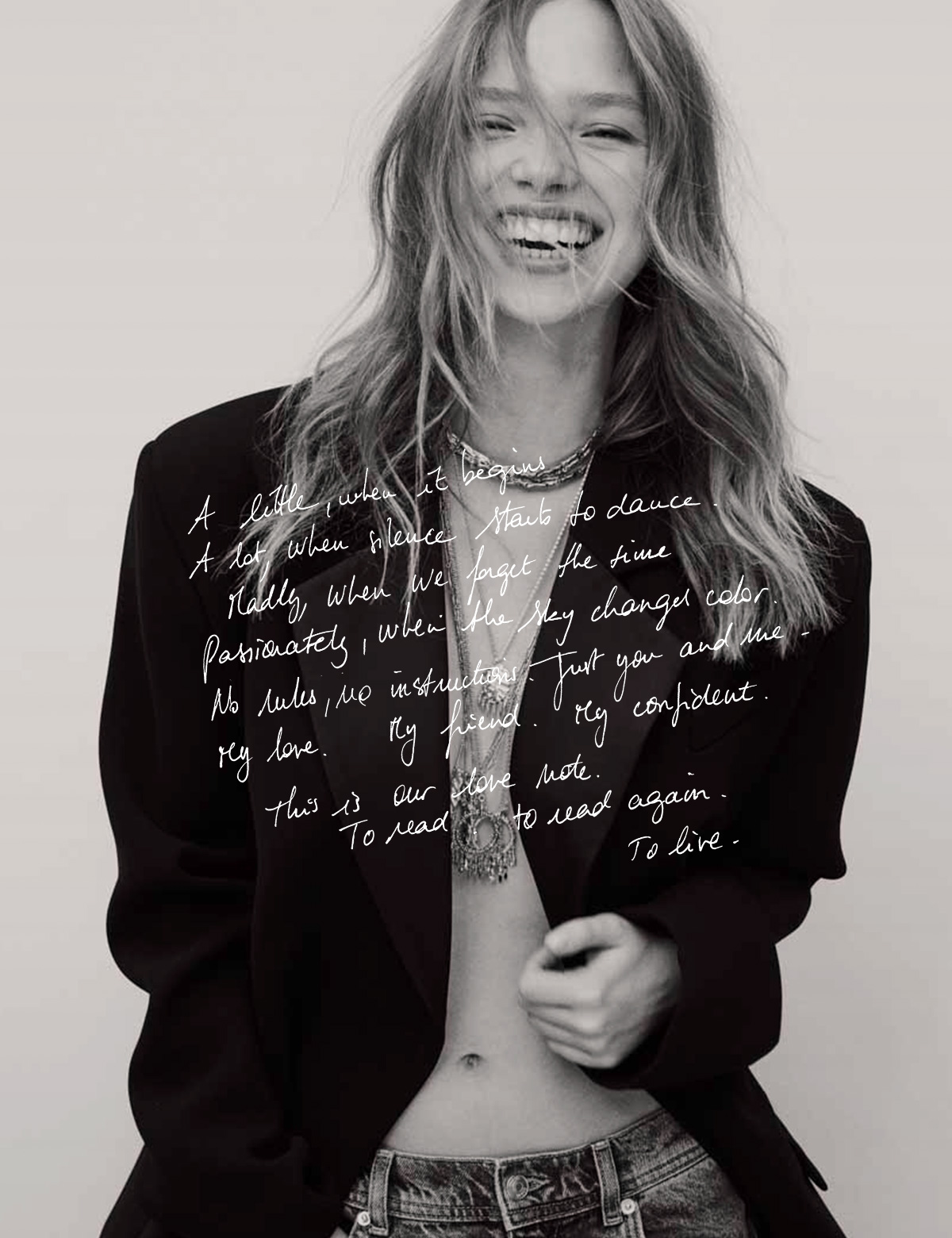 Blonde model wearing a black blazer and ba&sh necklaces