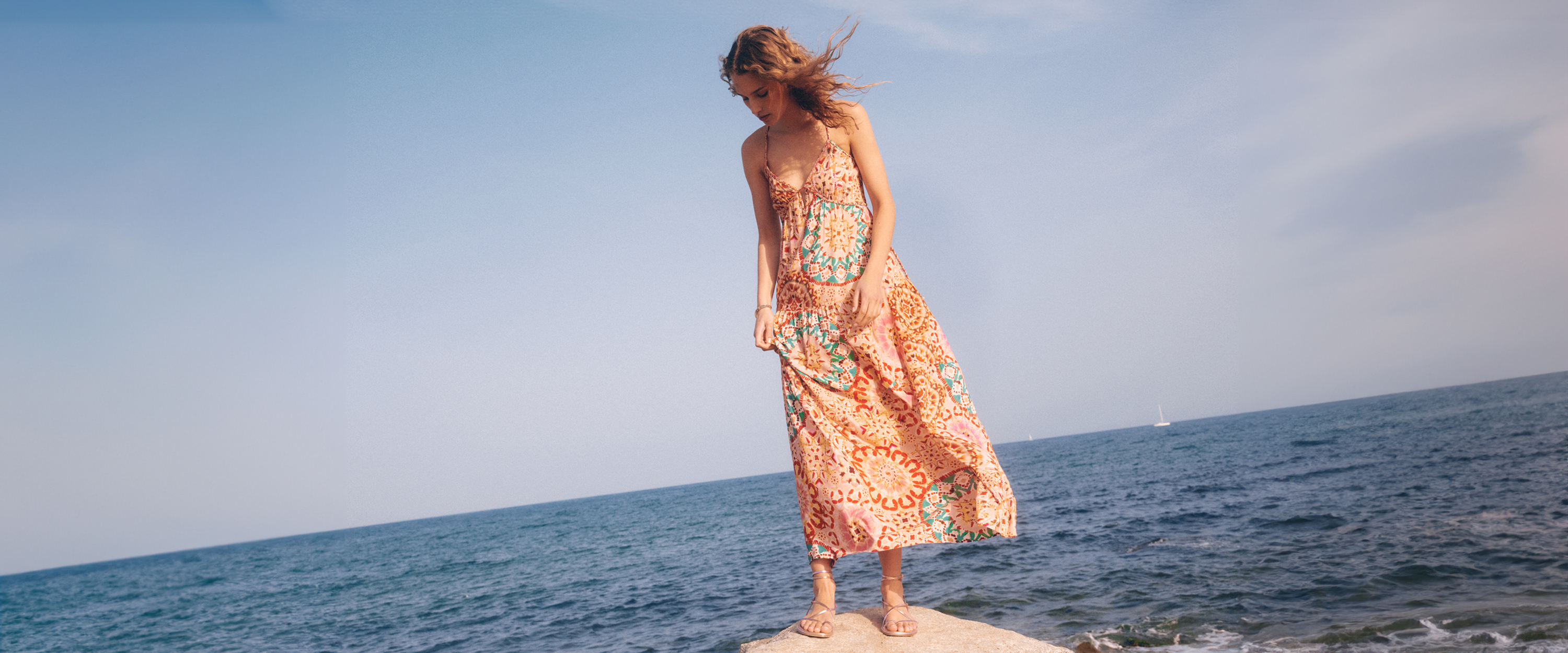 ba&sh new collection SS24, A moment in the sun. New long printed dresses, sandals