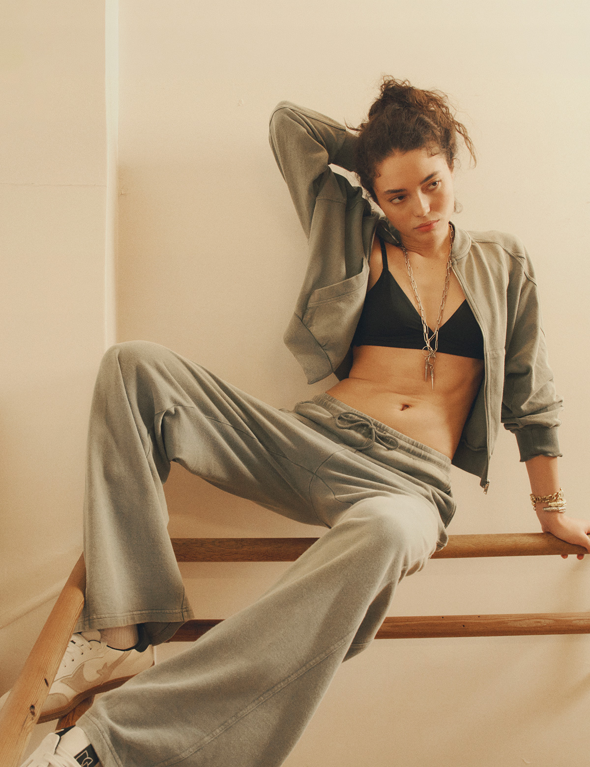 Woman wearing a kaki sport coord