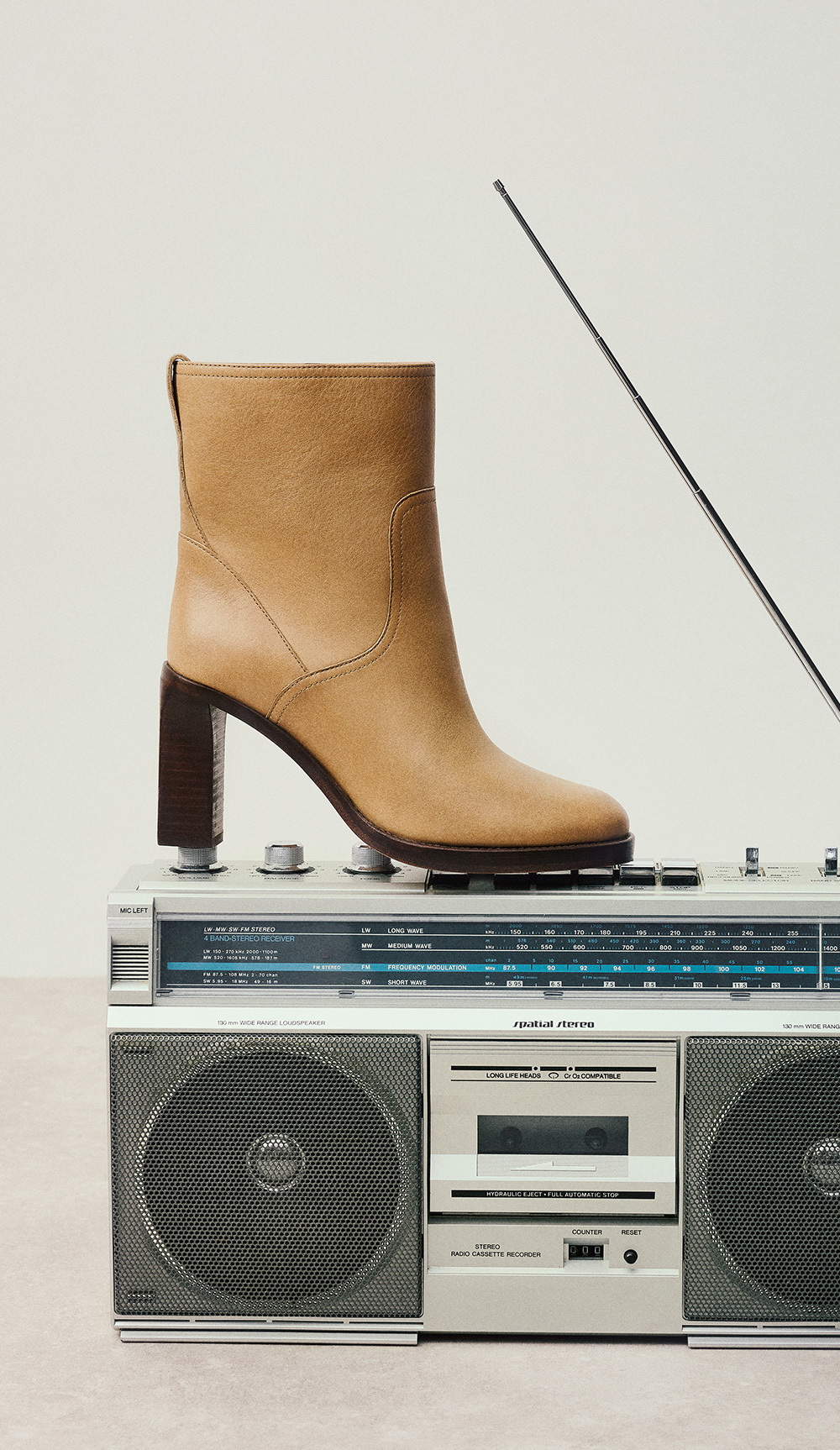 Boots placed on stereo