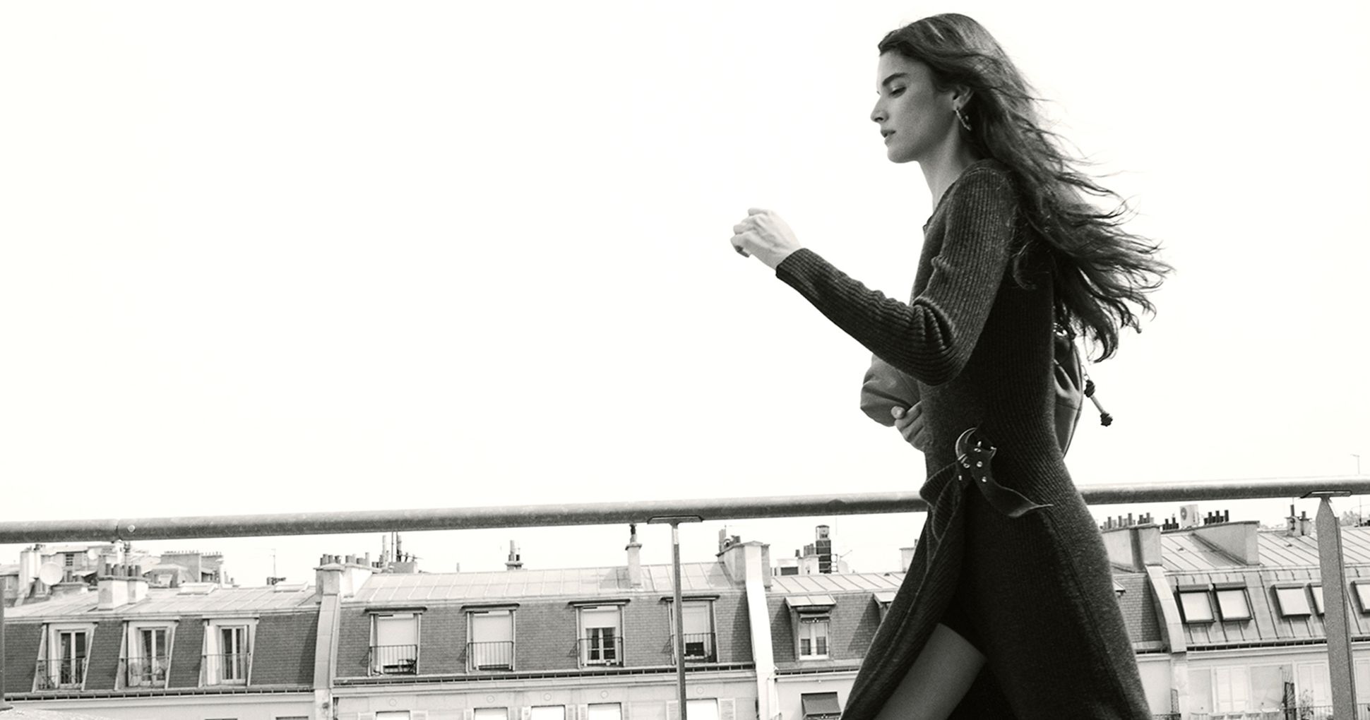 The model is wearing a knit dress 