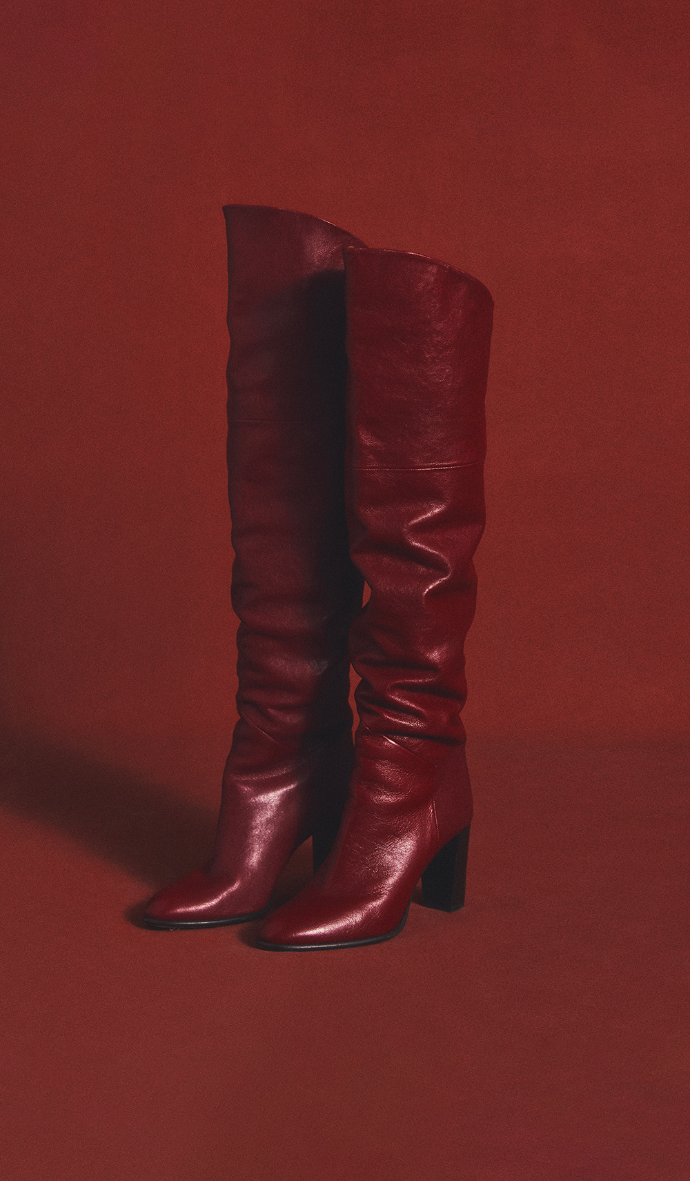 red leather over the knee boots
