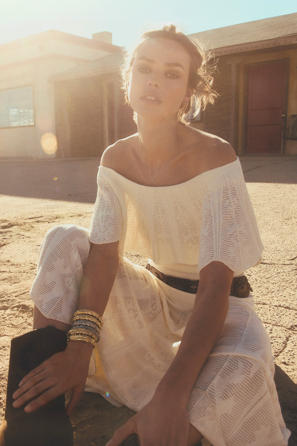 A model wearing a white dress