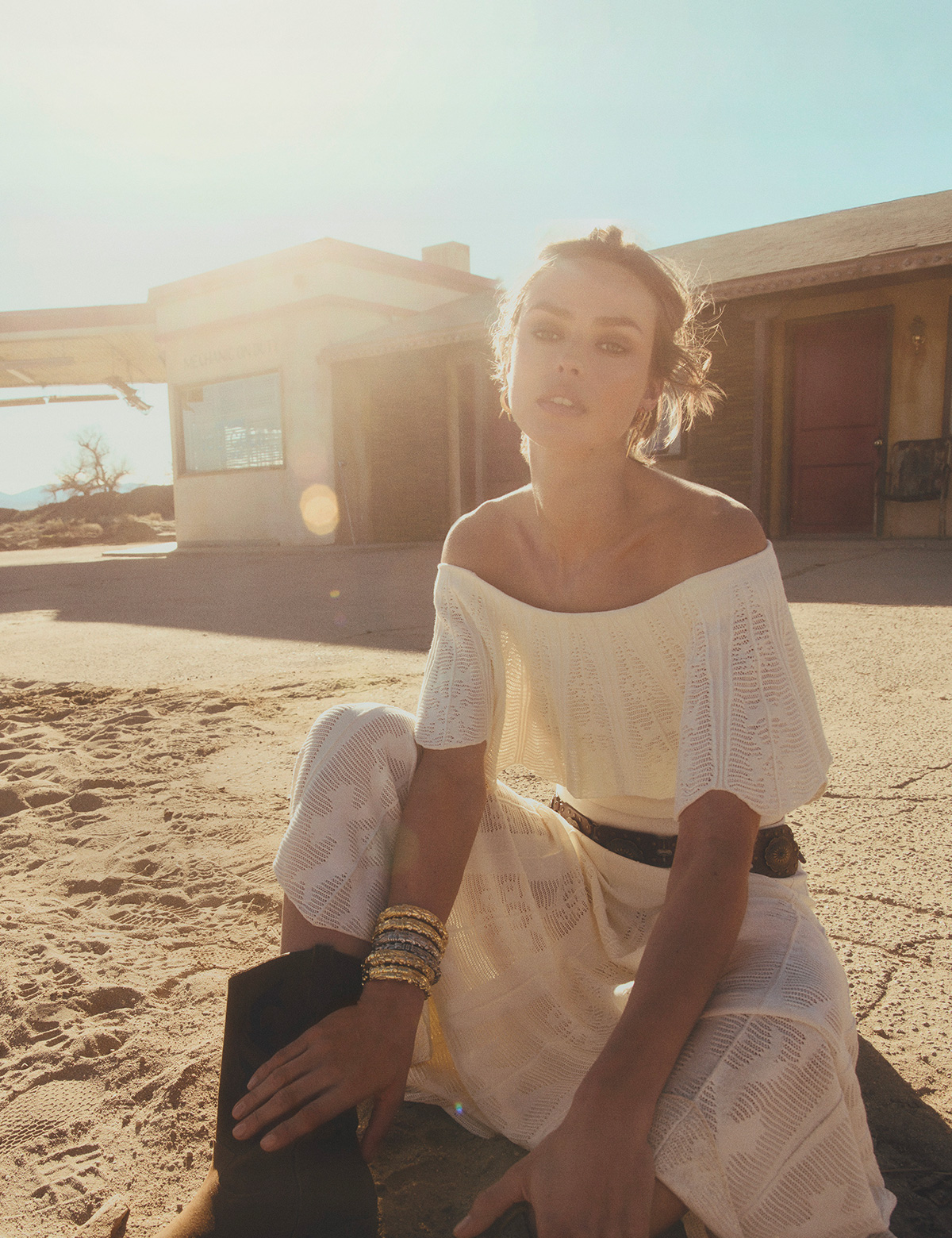 Woman wearing a white top and a skirt