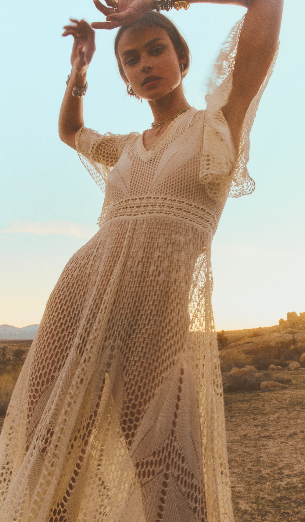 model wearing white dress