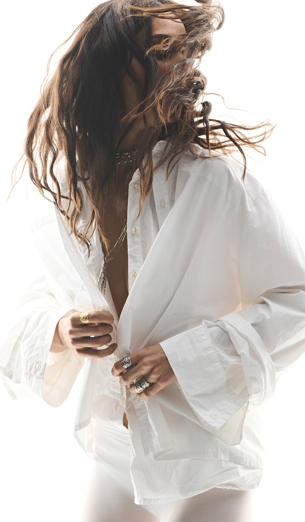 A model wearing a white skirt
